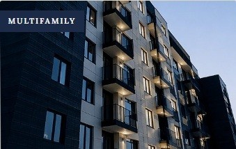 Multifamily apartment building at dusk